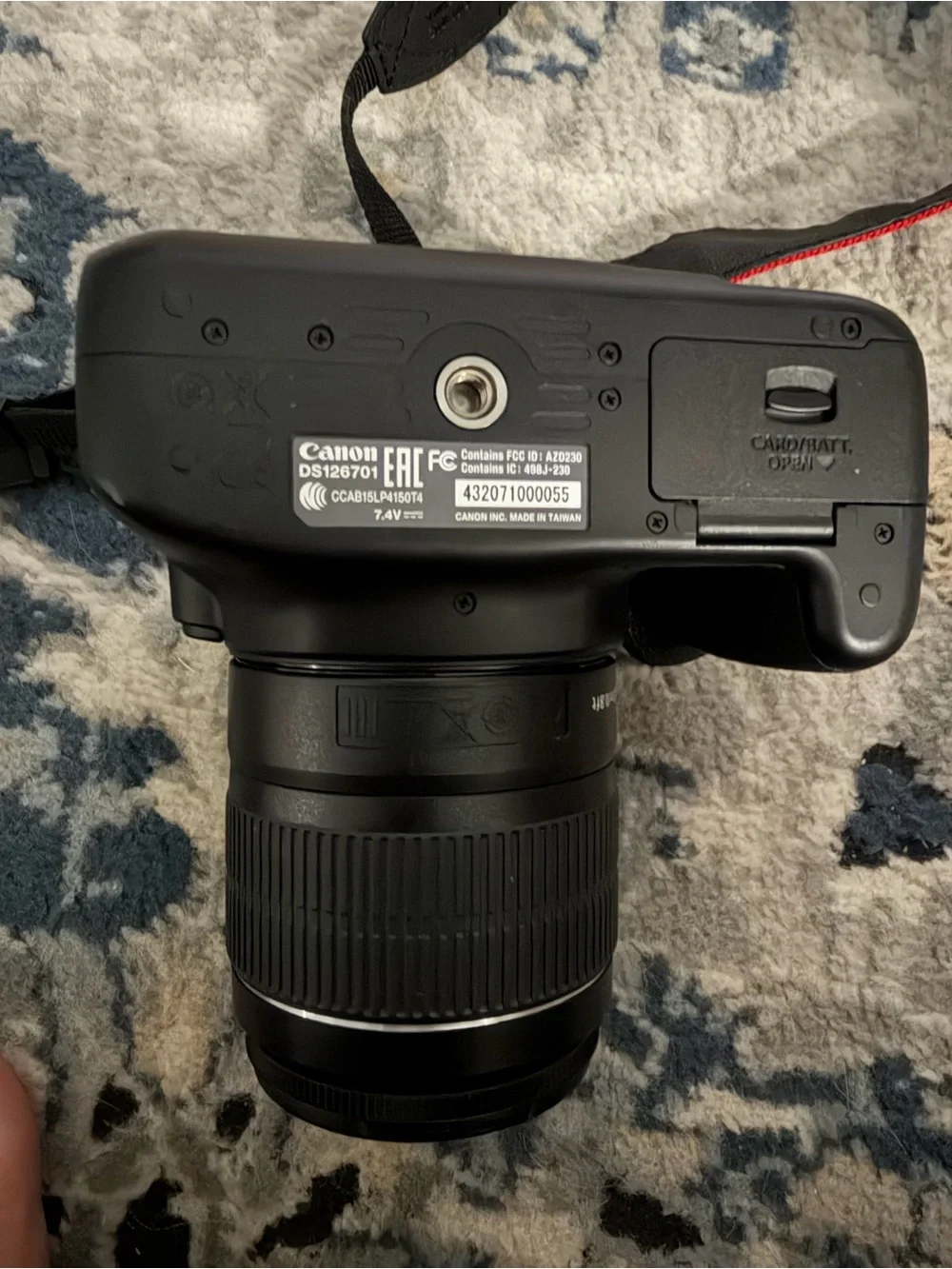 Canon EOS RebelT100 DSLR Camera with Kit Zoom Lens and Red-Trim Strap